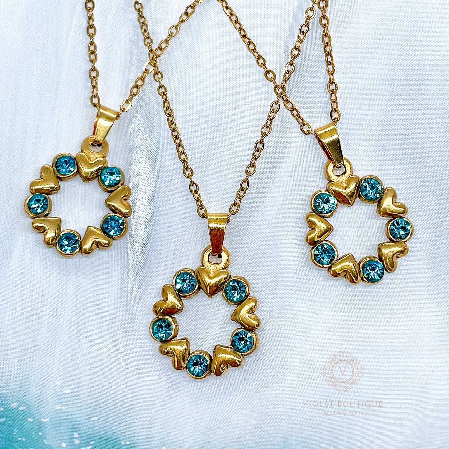 VB Elsa , 18K Gold Plated Aquamarine Hearts Circle Necklace.