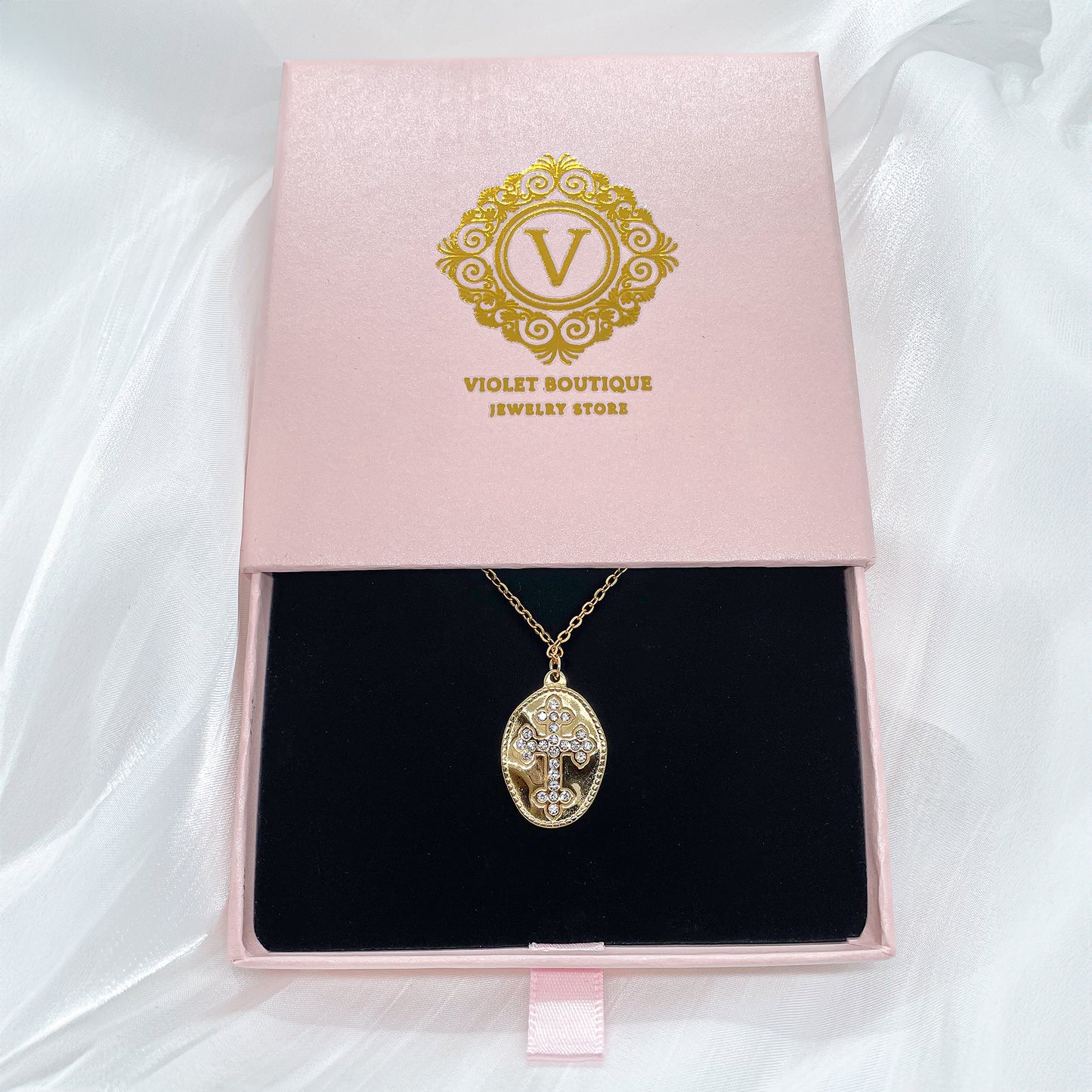 VB 18K Gold Plated Necklace with a Cross Rhinestones Medallion.